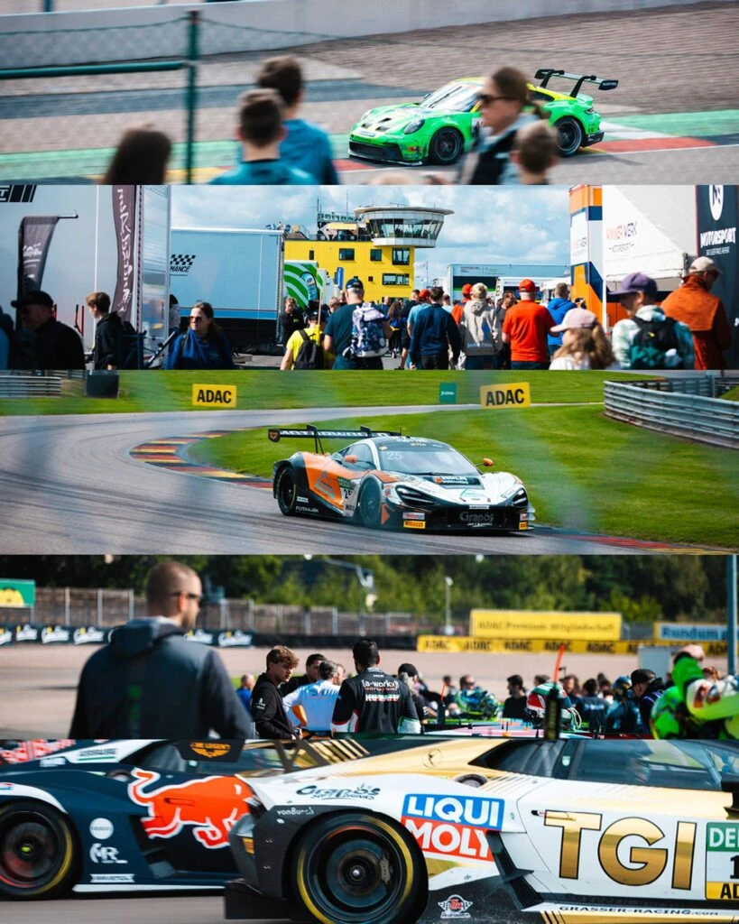DTM GT3-Rennwagen auf der Rennstrecke des Sachsenrings und Fans im Fahrerlager vor dem markanten Sachsenring-Turm.
